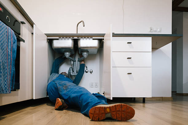 Professional Plumbing technician working in Hima, KY